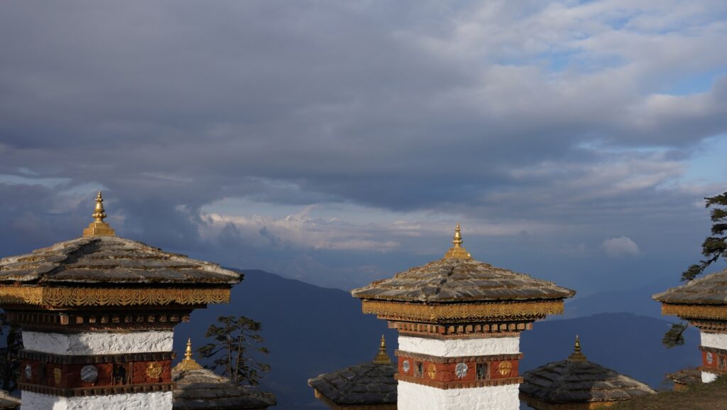 Traditional Bhutanese stupas at Dochula Pass with Himalayan views