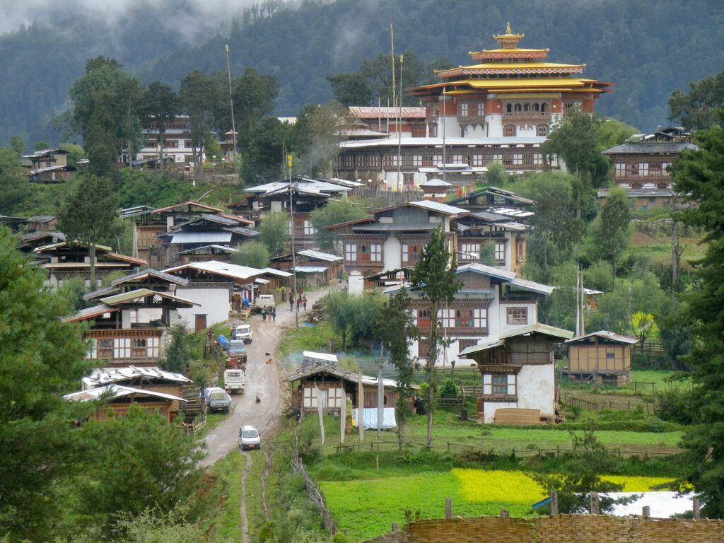 Traditional Bhutanese village set on a hillside in Phobjikha