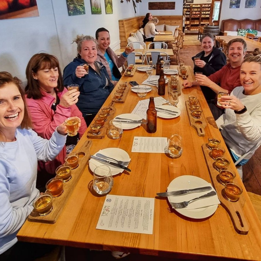 Group enjoying drinks at a table